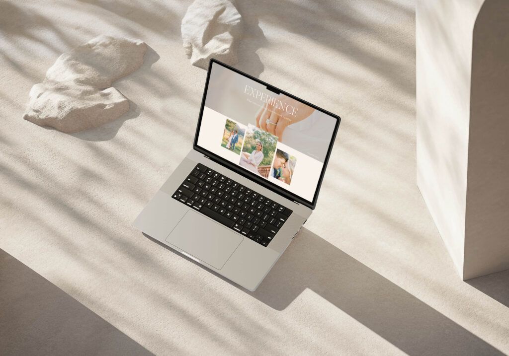 Best Yoga Website Templates Showit | High Tide Strategy Full Service Marketing Agency | A laptop on a textured beige surface displays a website with the word "Experience" and photos. Soft shadows and sunlight create a calm, inviting ambiance.